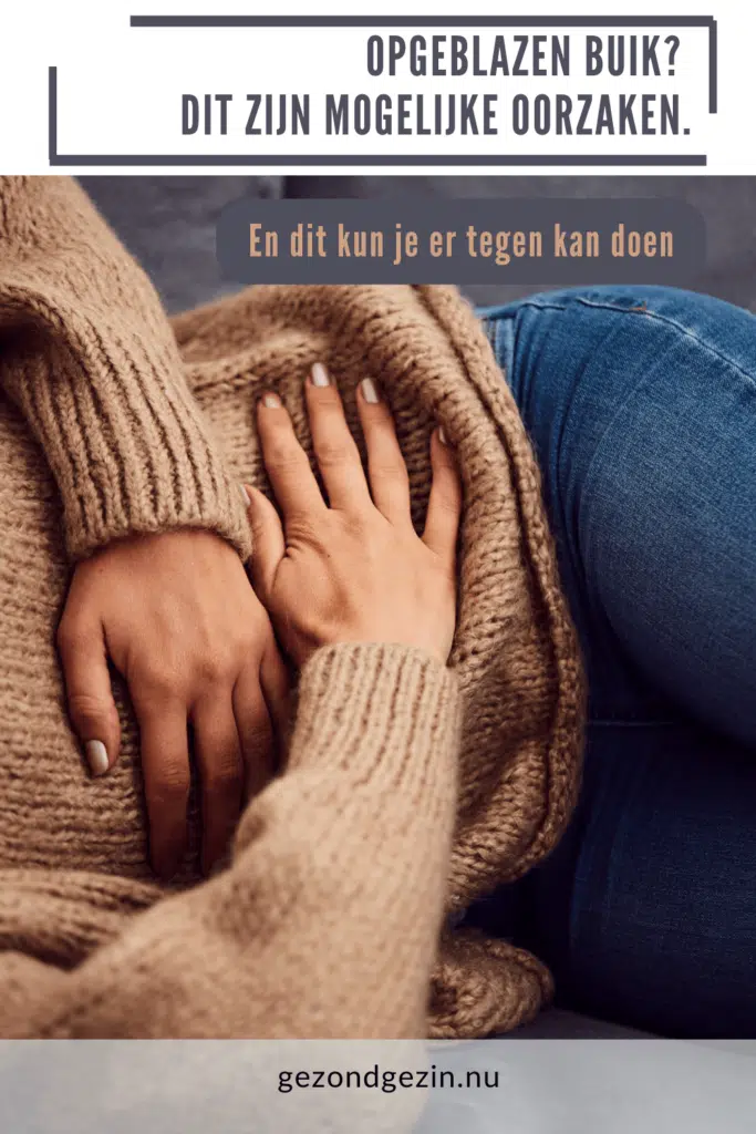 vrouw met handen op haar buik naar artikel over opgeblazen buik